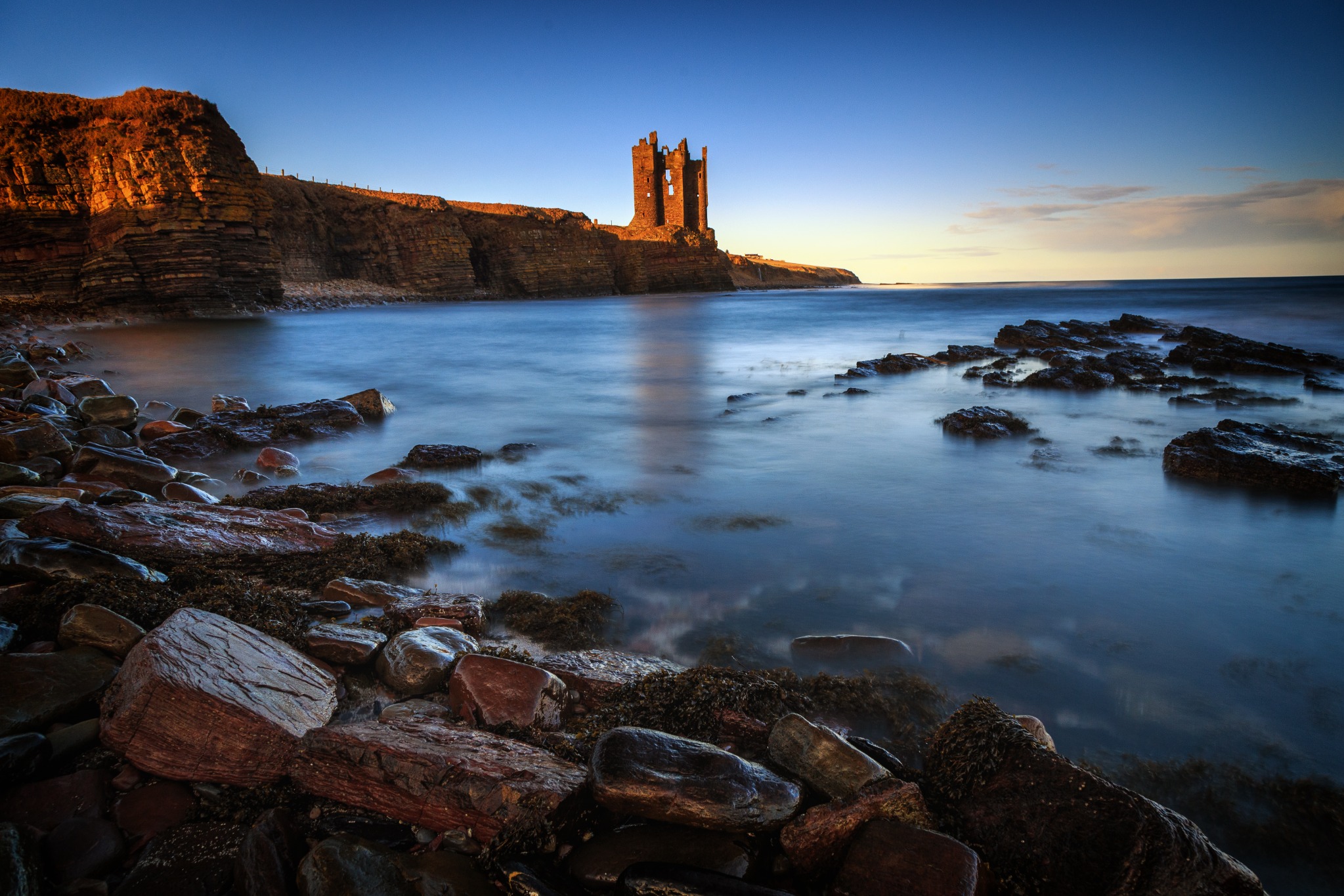 The dramatic ruins of Old Keiss Castle on the Scottish coast